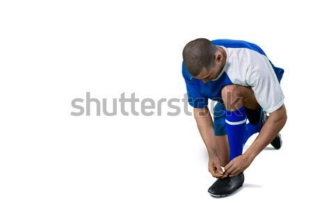 Football player tying his shoe lace Stock photo © wavebreak_media