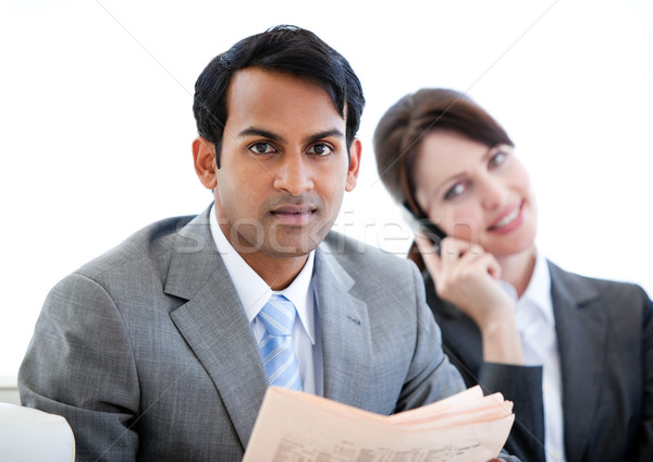 Confident businessman reading a newspaper in a waiting room Stock photo © wavebreak_media