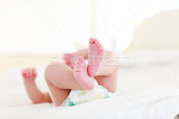 Bebé cama recién nacido cara feliz diversión Foto stock © wavebreak_media