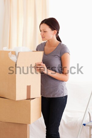 Young woman having a break between boxes Stock photo © wavebreak_media