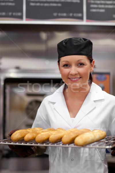 [[stock_photo]]: Joli · jeunes · Baker · baguettes · cuisine · femme