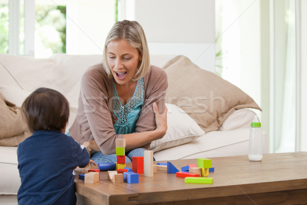 Mother playing with her child at home Stock photo © wavebreak_media