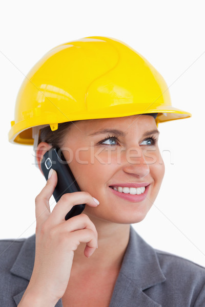 關閉 女 建築師 手機 頭盔 白 商業照片 © wavebreak_media