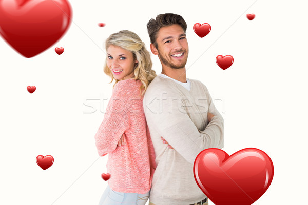 Foto stock: Imagen · atractivo · Pareja · sonriendo · los · brazos · cruzados