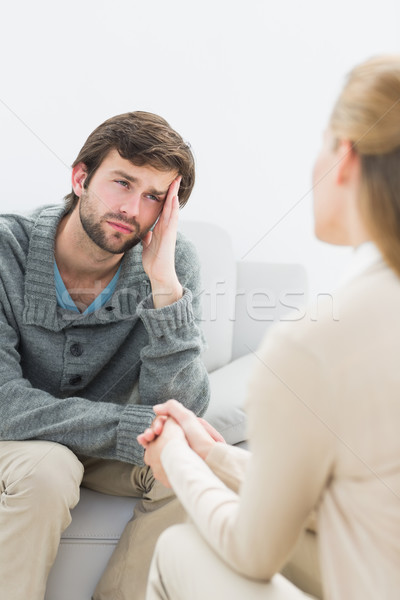Young man in meeting with a psychologist Stock photo © wavebreak_media