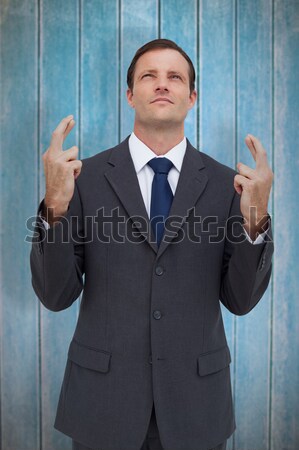 Businessman standing with clenched fists Stock photo © wavebreak_media