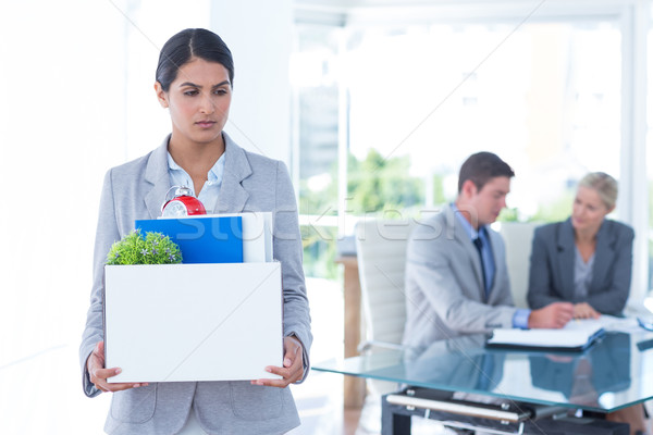 Businesswoman carrying her belongings in box Stock photo © wavebreak_media