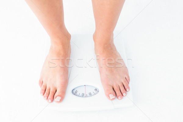 Nő áll mérleg fehér egészség női Stock fotó © wavebreak_media
