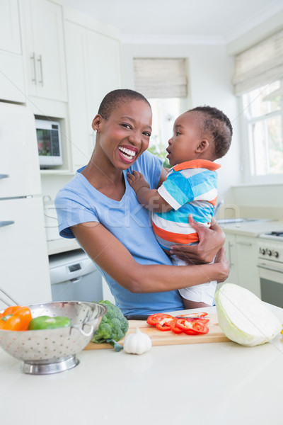 Happy smiling mother with his babyboy  Stock photo © wavebreak_media