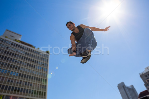  Man doing parkour in the city Stock photo © wavebreak_media