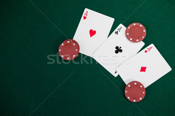 Cartes à jouer jetons de casino poker table casino vert [[stock_photo]] © wavebreak_media