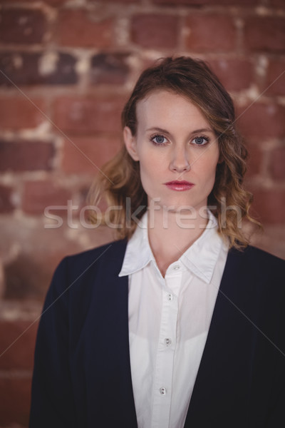 Portrait of confident young attractive female editor at coffee shop Stock photo © wavebreak_media