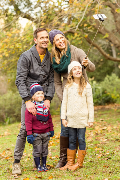 Smiling young family taking selfies Stock photo © wavebreak_media