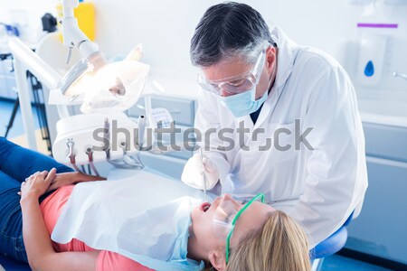 Vue dentiste femme dentaires [[stock_photo]] © wavebreak_media