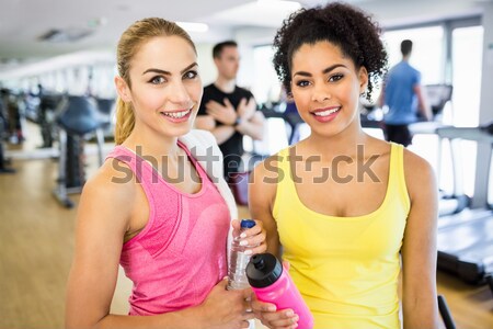 Athletic smiling women posing together Stock photo © wavebreak_media