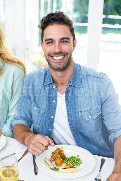 Porträt glücklich Mann Essen Esstisch Haus Stock foto © wavebreak_media