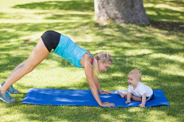 Woman exercising with her baby  Stock photo © wavebreak_media