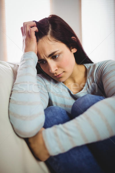 [[stock_photo]]: Déprimée · femme · séance · maison · jeune · femme · canapé