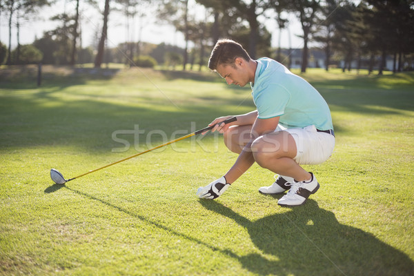 Сток-фото: вид · сбоку · молодым · человеком · мяч · для · гольфа · области · человека