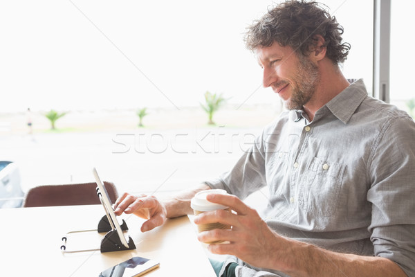 Man using digital tablet Stock photo © wavebreak_media