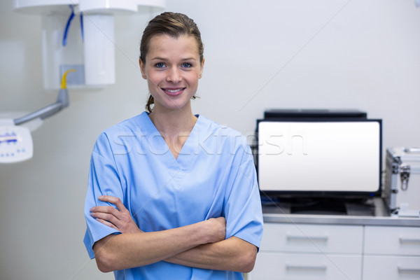 Portrait of dental assistant standing with arms crossed Stock photo © wavebreak_media