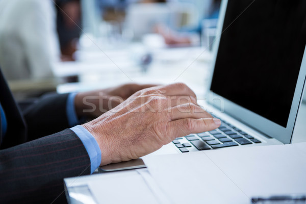 Empresário trabalhando laptop escritório negócio Foto stock © wavebreak_media