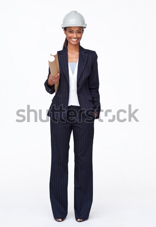 Isolated ethnic female architect holding plans  Stock photo © wavebreak_media