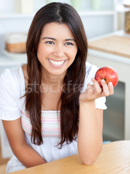çekici genç kadın kırmızı elma mutfak gülümseme Stok fotoğraf © wavebreak_media