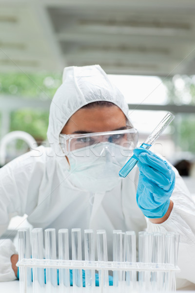 Portrait of a protected serious scientist holding a test tube in a laboratory Stock photo © wavebreak_media