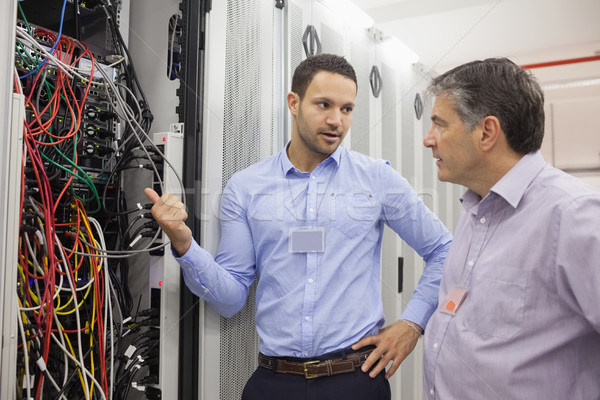 Two technicians discussing wiring in data center Stock photo © wavebreak_media