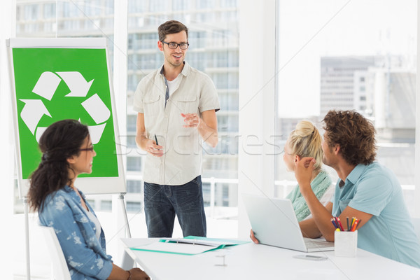 Stock photo: Casual team having meeting about eco policy