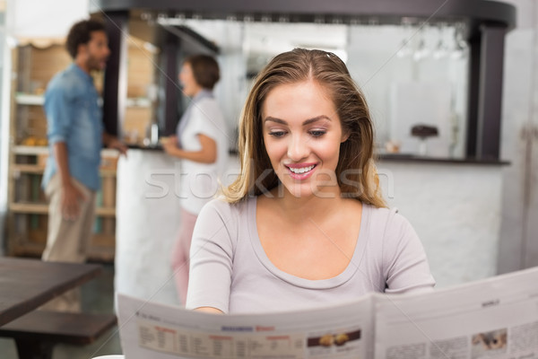 Csinos szőke nő olvas újság kávéház férfi Stock fotó © wavebreak_media
