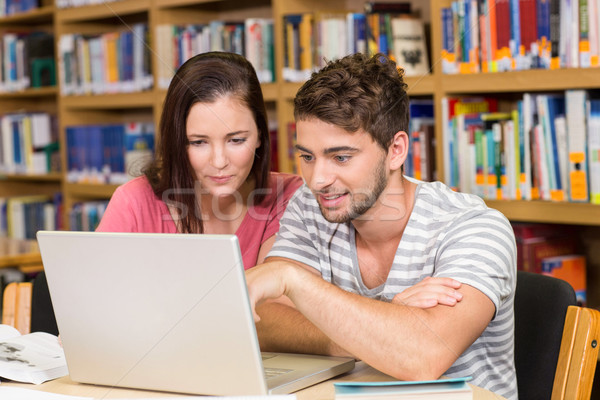 College students using laptop in library Stock photo © wavebreak_media