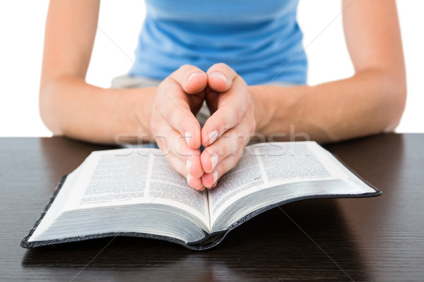 Mulher oração leitura bíblia branco livro Foto stock © wavebreak_media