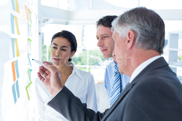 Foto stock: Gente · de · negocios · lluvia · de · ideas · junto · oficina · mujer · papel