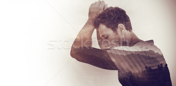 Composite image of upset man leaning on white background Stock photo © wavebreak_media