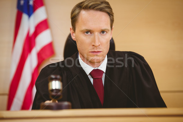 Portrait of a judge about to bang gavel on sounding block Stock photo © wavebreak_media