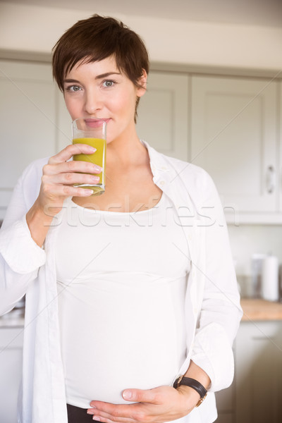 Stockfoto: Zwangere · vrouw · sinaasappelsap · home · keuken · gelukkig