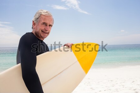 肖像 笑みを浮かべて シニア 男 サーフボード ストックフォト © wavebreak_media