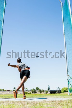 Rugby player kicking ball for goal against clear blue sky Stock photo © wavebreak_media
