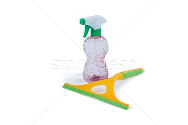 Detergent spray bottle and window squeegee on white background Stock photo © wavebreak_media