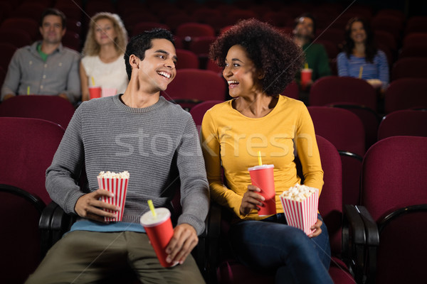 Happy couple watching movie in theatre Stock photo © wavebreak_media