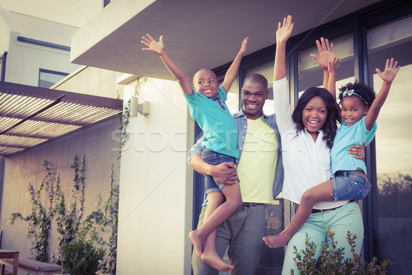 Familia feliz pie jardín nina ninos Foto stock © wavebreak_media