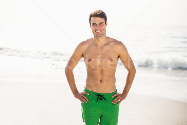 Portrait homme nager short permanent plage [[stock_photo]] © wavebreak_media