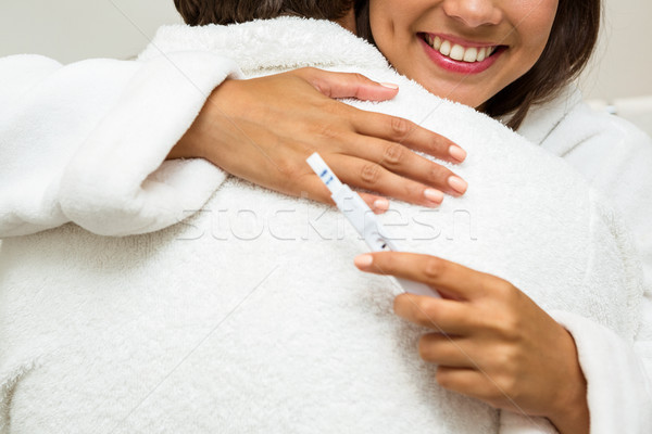 Frau schauen Schwangerschaftstest Mann Bademantel Stock foto © wavebreak_media
