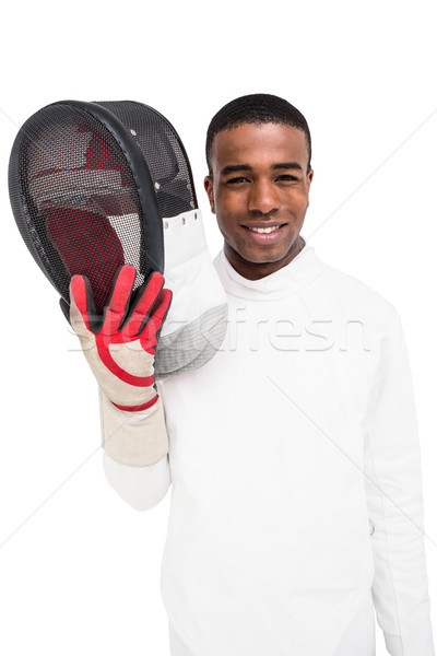 Swordsman holding fencing mask Stock photo © wavebreak_media