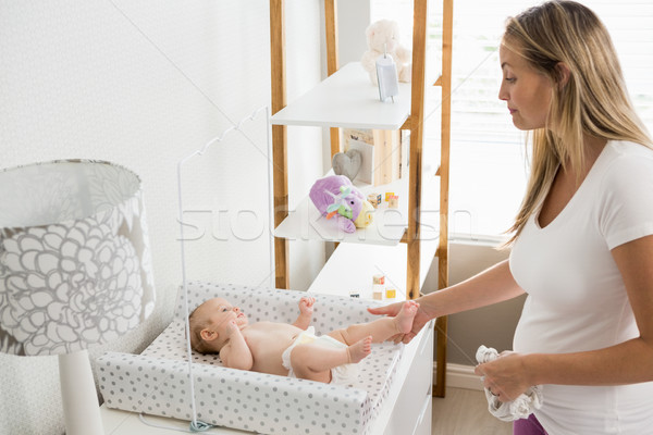 Stockfoto: Moeder · luier · baby · home · vrouw · schone