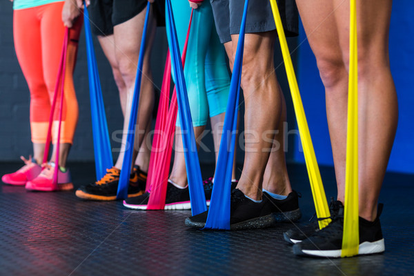 Sportolók testmozgás ellenállás zenekar tornaterem alacsony Stock fotó © wavebreak_media