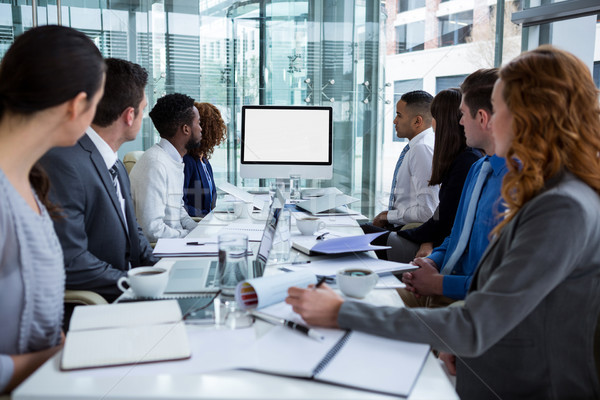 Business people looking at a screen during a video conference Stock photo © wavebreak_media