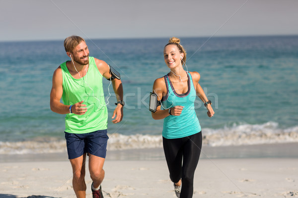 Foto d'archivio: Sorridere · jogging · donna · spiaggia · uomo